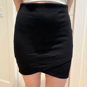 Talula Black Mini Skirt with Subtle Wrap Hem